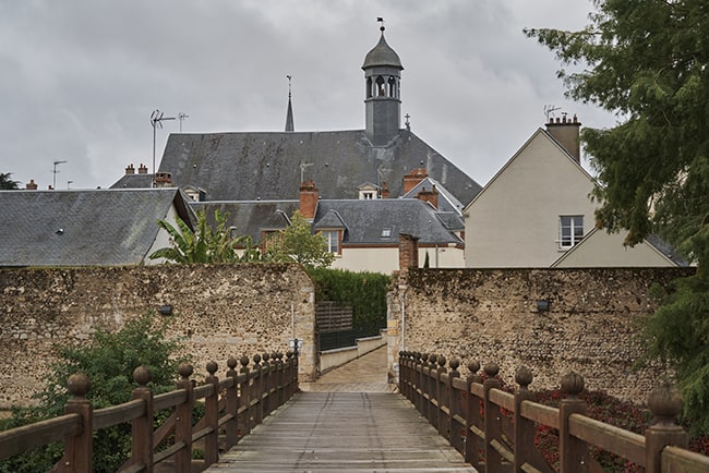 Explore the town of Sully-sur-Loire via this inviting bridge.