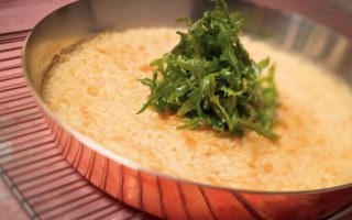 Risotto Cake with Parmesan and Rocket with Olive Oil