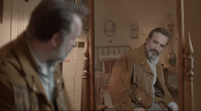 Jean Dujardin as a jacket-obsessed loopy serial killer in “Deerskin”