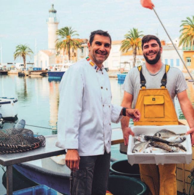 Two men, a chef and a fisherman in front of the Mediterannean sea - Côté Fish