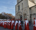 robed members entering the church